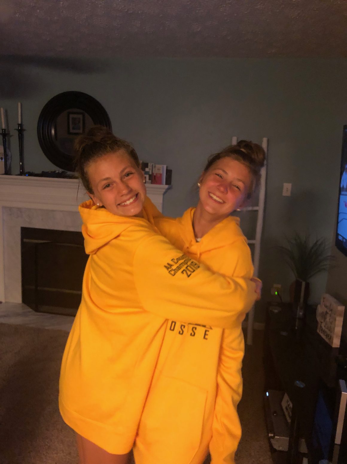 A Middie and her Goalie celebrating the latest in Championship Wear!